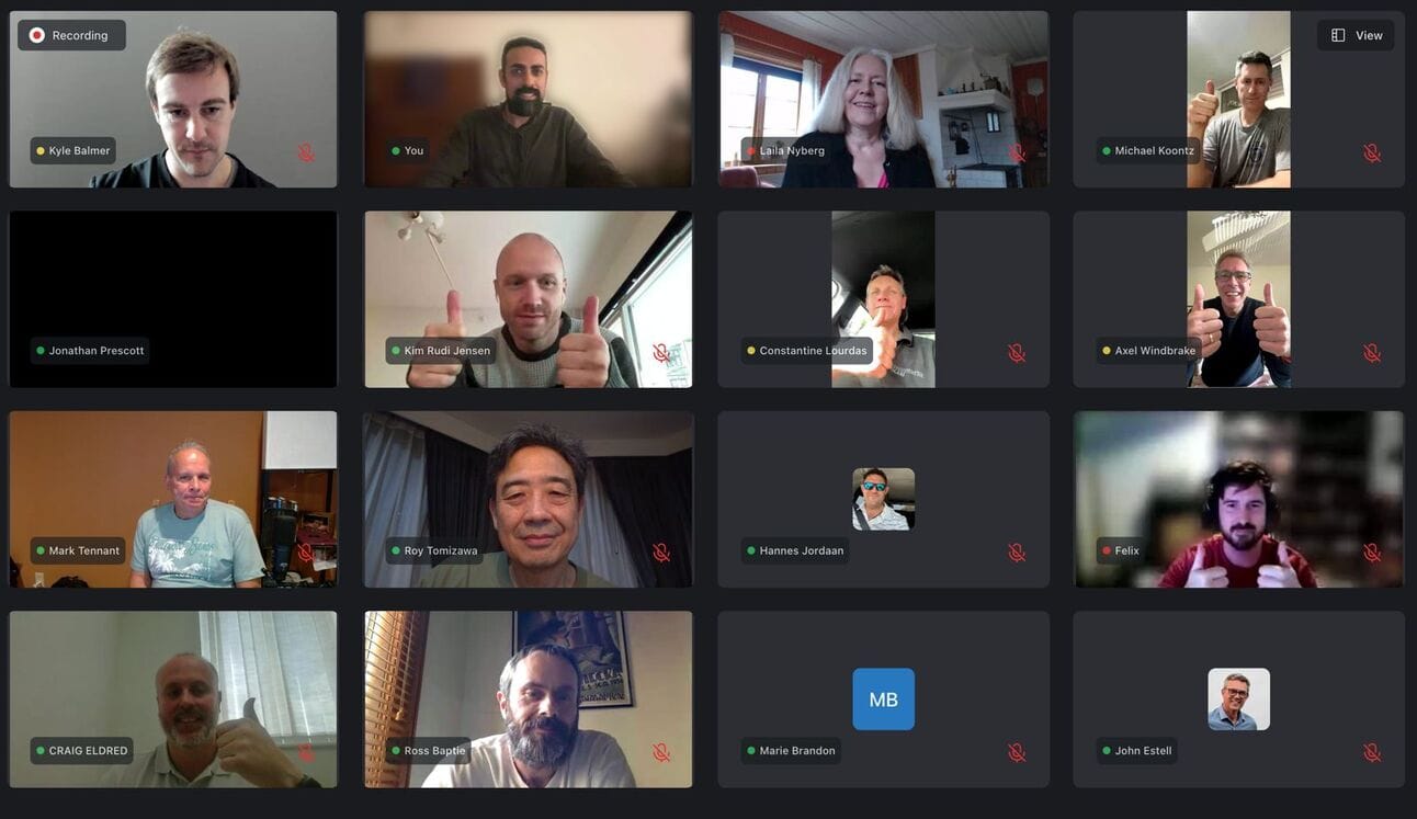 Zoom-style video call with 16 AI Workshop Kit holders